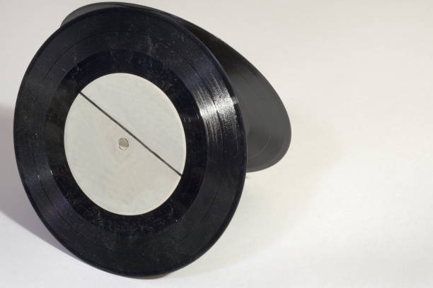 istock vinyl records, standing on edge, backing each other 942796294