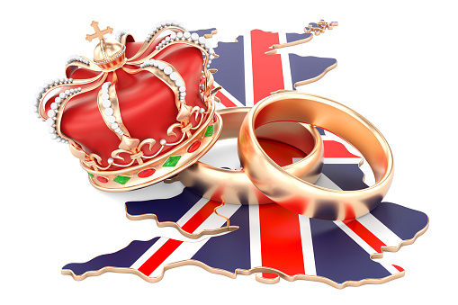 Royal wedding concept. Wedding rings with royal crown on the British map, 3D rendering