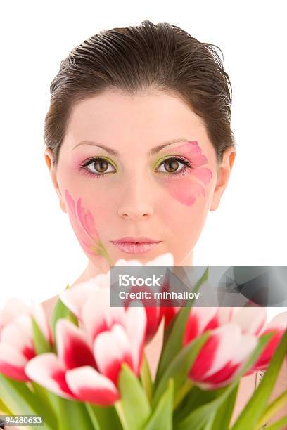 Mujer Cabeza Y Los Tulipanes Foto de stock y más banco de imágenes de Adulto - Adulto, Adulto joven, Belleza