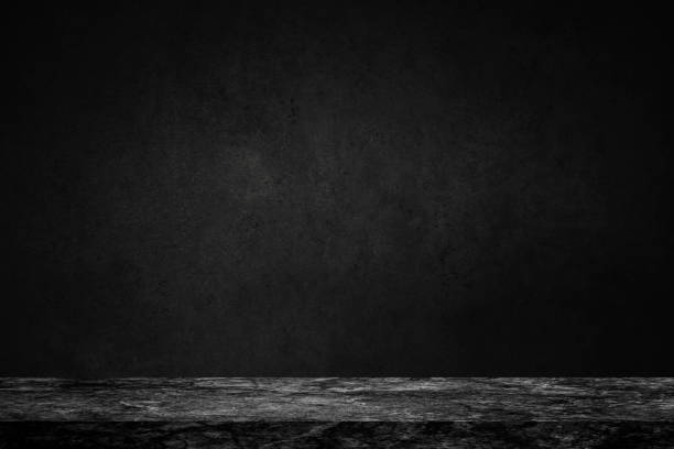 istock Empty top of black marble stone table on concrete wall background texture grunge and grey surface with space or display for add text or image and product. Loft style. 942809178