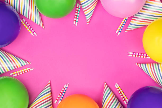 istock Birthday party composition on pink background. Top view with copy space. 942809182