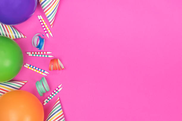 istock Birthday party composition on pink background. Top view with copy space. 942809204