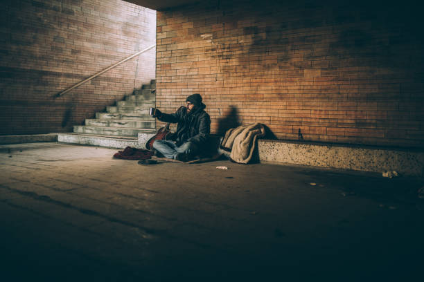 istock Homeless man pleading 942810624
