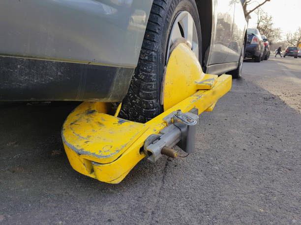 istock Car wheel blocked by wheel lock/clamp in Montreal, Canada 942810826
