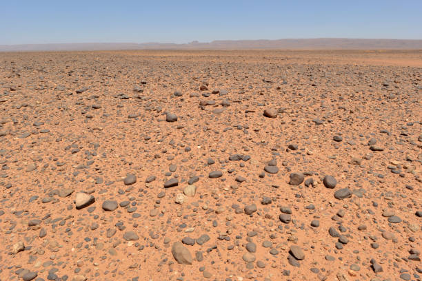 Picture of typical, Saharan hamada. Sahara is the largest desert in the world with  3,600,000 square miles (9,200,000 sq km), comparable to the area of the United States. It is mainly rocky hamada (stone plateaus), ergs (sand dunes) form only a minor part. The landforms found in the Sahara are mountains, plateaus, rocky plains, and sand dunes. Picture taken in Morocco, near Erg Chigaga.