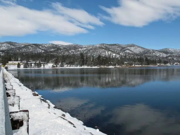 Snow blankets the hills in this image of Big Bear Lake, a resort located in the San Bernardino mountains famed for its skiing.