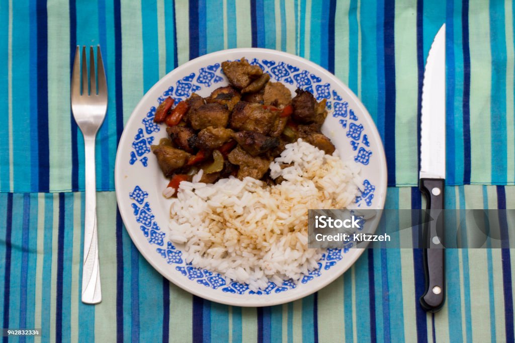 Kao Krapaomoo Variation of “Kao Krapaomoo” . Rice with tired munched pork and basil, pepper bell and apio. Thai food. Asian Food Stock Photo