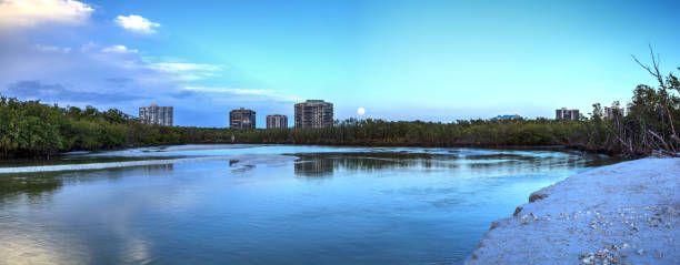 istock Moonrise over River leading to the ocean 942833082