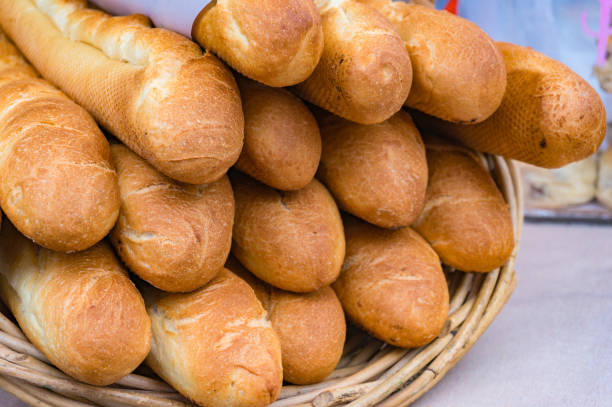 istock Fresh baguettes, French sticks on display 942854172