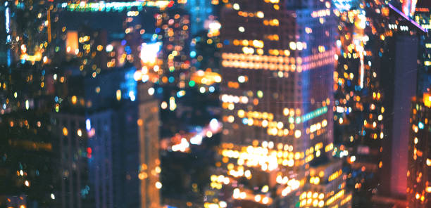 istock Blurred abstract bokeh background of NY at night 942857496