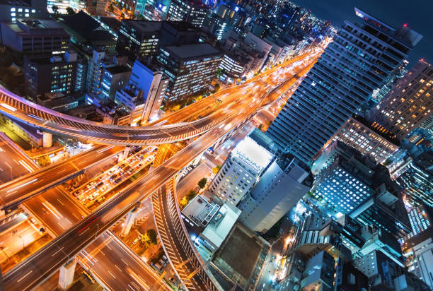 istock Aerial view of a highway intersection in Osaka, Japan 942857586