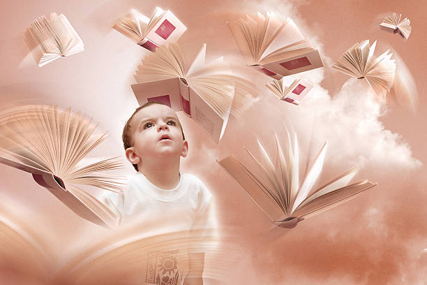 istock Child looking at flying books 94285893