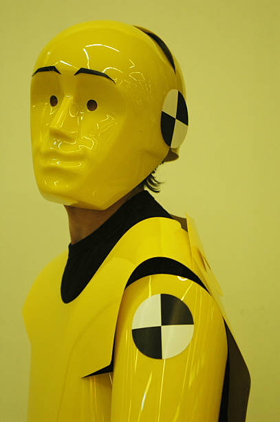 Person in crash-test dummy suit stock photo