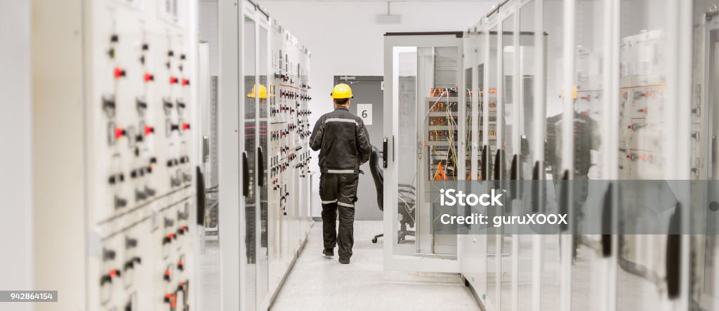 Using protective relay and medium voltage switchgear. Engineering department Using protective relay and medium voltage switchgear. Engineering department. Bay control unit Electricity Stock Photo