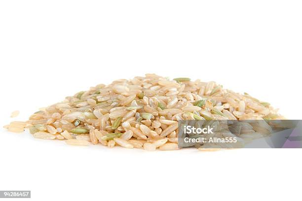 Pile Of Brown Rice On White Stock Photo - Download Image Now - Black Color, Brown, Brown Rice