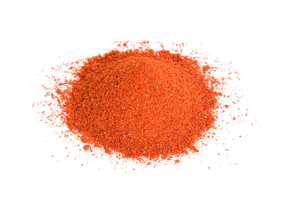 istock Pile of cayenne pepper isolated on white 94286715
