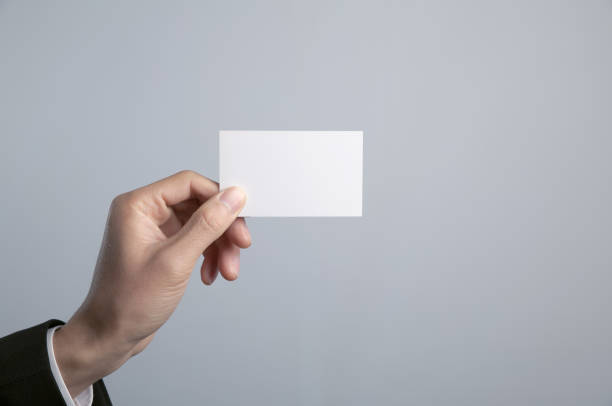 istock people is holding business card in hand 942869928