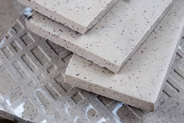 istock Laying and cutting tiles. Tools and building materials at a working position. Tiles for industrial and technical applications. Material Gres. 942870184