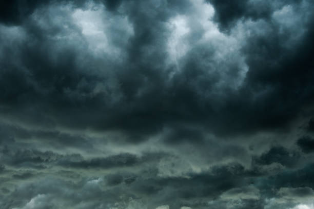istock Dark clouds and thunderstorm with rainy, Dramatic  black clouds in summer 942870200