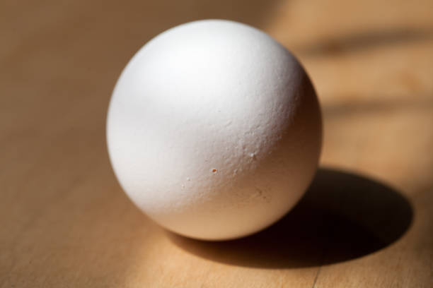 istock Small pin hole on the edge of egg shell 942873310