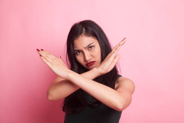 istock Beautiful young Asian woman say no. 942873514