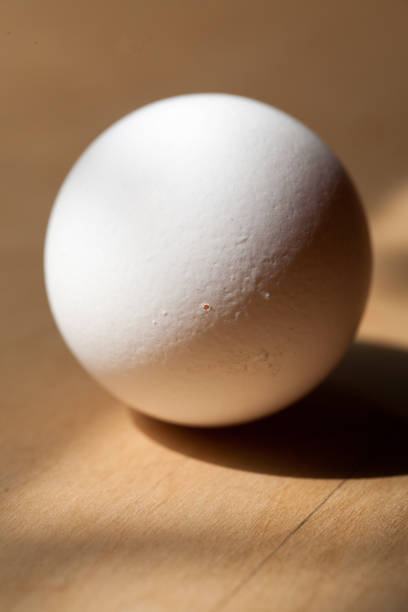 istock Small pin hole on the edge of egg shell 942873810