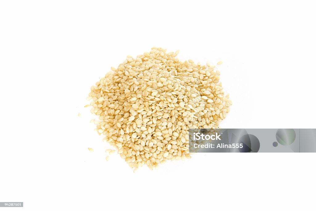 Sesame seeds on white  Sesame Seed Stock Photo