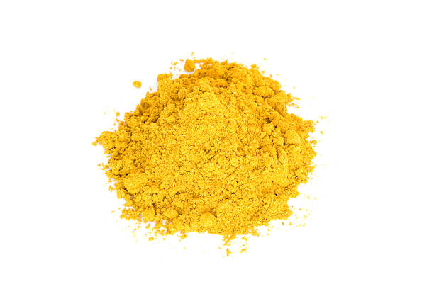 istock Pile of yellow curry on white 94287565
