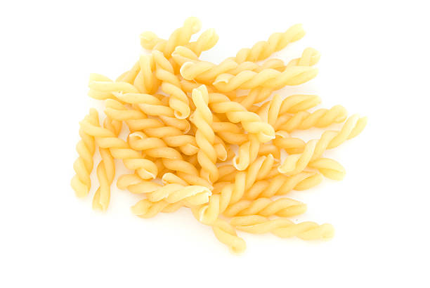 istock Pile of gemelli pasta on white 94287706
