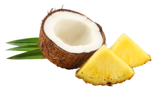 istock Coconut with pineapple and green leaves isolated on white background 942881232