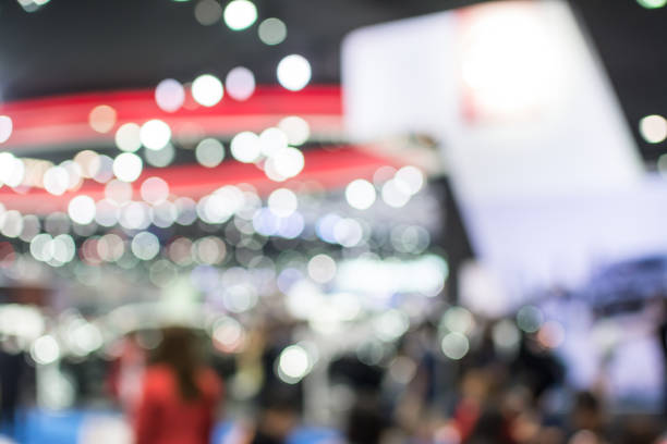 istock Abstract blurred image of crowd people in exhibition show 942885102