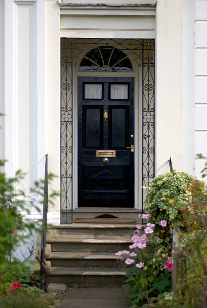 istock Black door with flowers 94288769