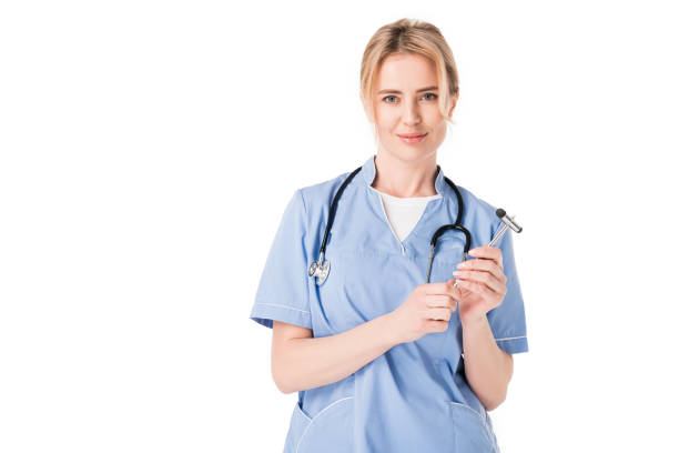 istock Young nurse holding reflex hammer isolated on white 942888620