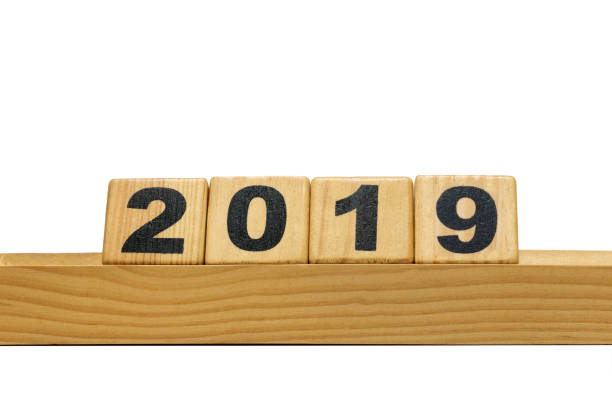 istock New Year 2019 with wood block isolated on white background 942888910