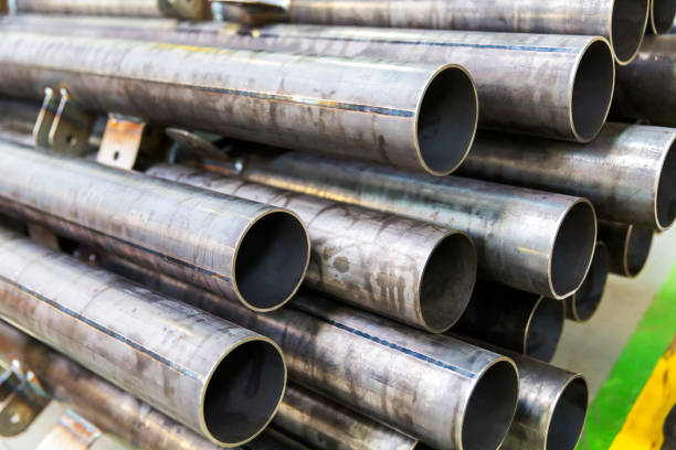 istock Pipes in the production warehouse are arranged on shelves 942902968