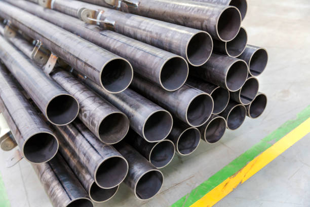 istock Pipes in the production warehouse are arranged on shelves 942903008