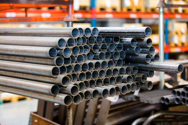 istock Pipes in the production warehouse are arranged on shelves 942905108