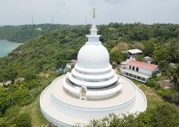 A large white pagoda on top of a mountain. Aerial drone View Travel in Asia Aerial View anuradhapura photos stock pictures, royalty-free photos & images