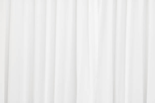 istock White fabric texture background. Crumpled of curtains material. 942909470