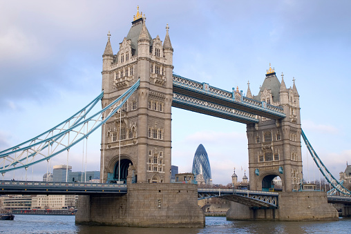 London, England - Aril 2, 2012: Tower Bridge, most famous bridge in London across the River Thames. Bridge is combined bascule and suspension bridge built between 1886 and 1894