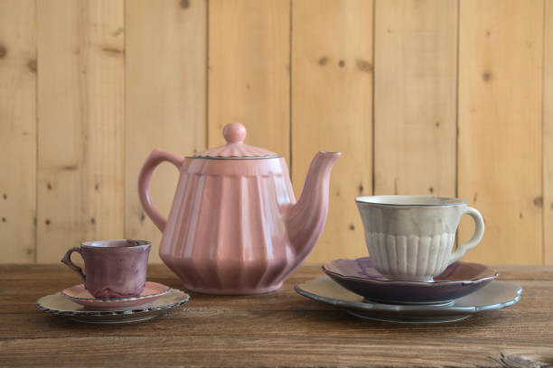 istock Teapot with teacup  ceramic on wood background. 942917268