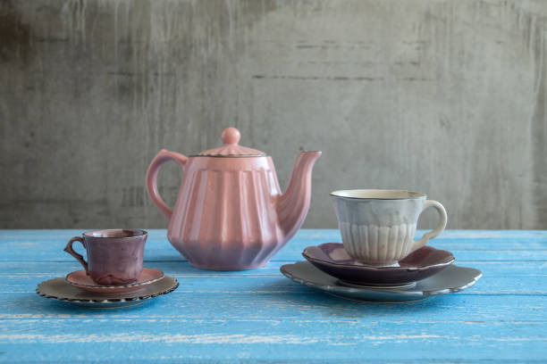 istock Teapot with teacup  ceramic on wood background. 942917294