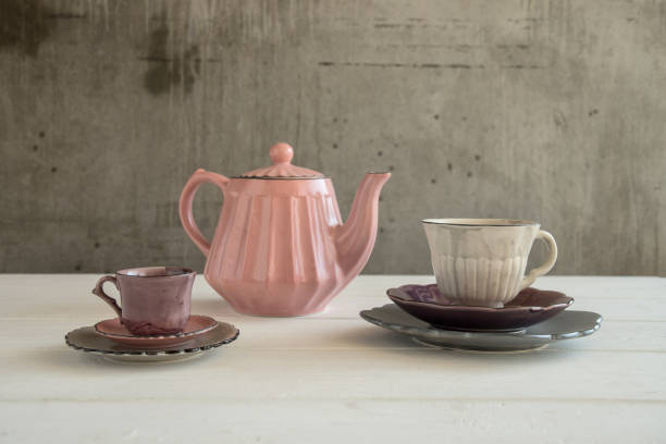 istock Teapot with teacup  ceramic on wood background. 942917298