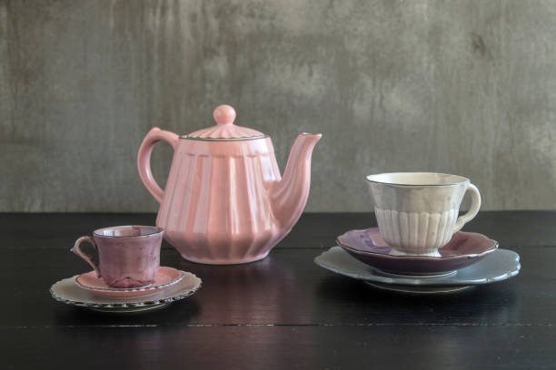 istock Teapot with teacup  ceramic on wood background. 942917302