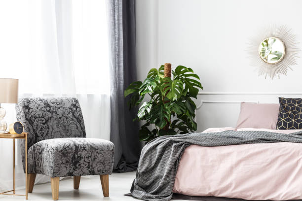 istock Patterned armchair in cozy bedroom 942917376