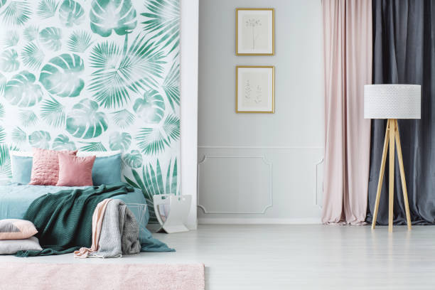 istock Cozy pale green and pink bedroom 942920070