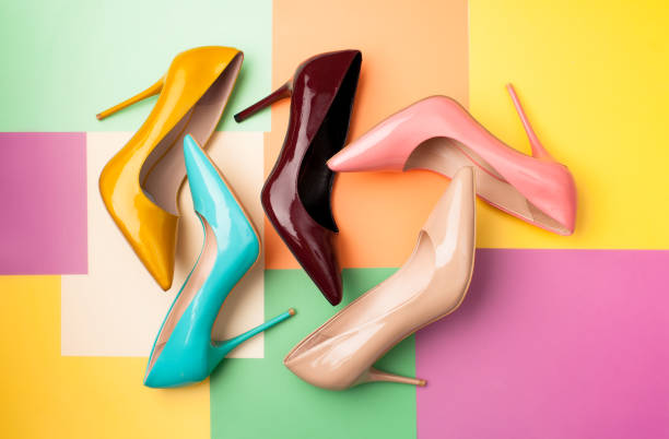 istock Set of colored women's shoes on a colored background 942924282