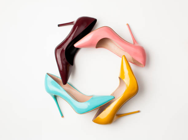 istock Set of colored women's shoes on white background 942924328