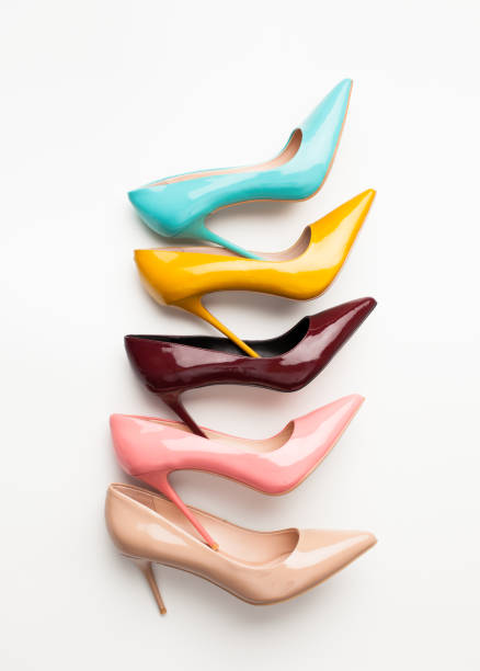 istock Set of colored women's shoes on white background 942926420