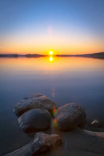 Photo of Summer midnight sunset from Kuhmo, Finland.